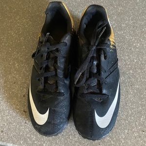 Nike Black and gold indoor soccer cleats. Hardly worn.